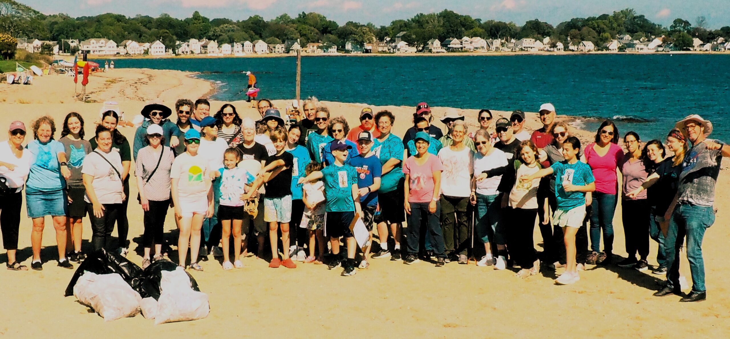 Temple Emanuel Members Clean Woodmont Beach as part of the New Year Celebration